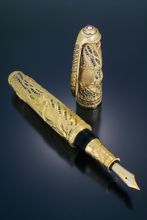 Solid gold fountain pen with sculptured animal motifs and colourful gems 